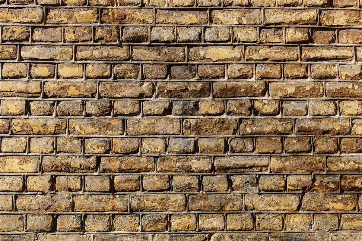 Fototapeta Ściana z nieobrobionych cegieł