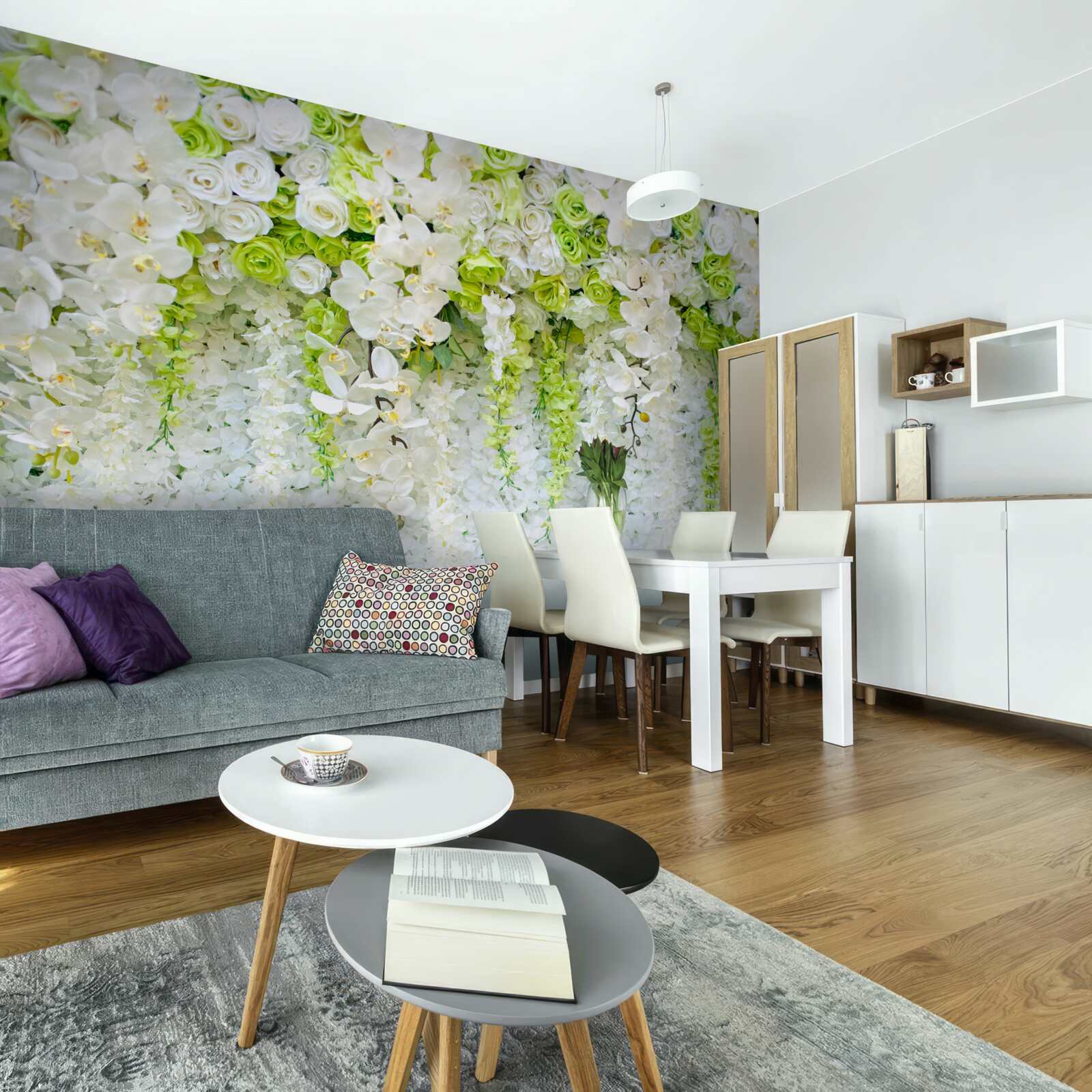 Fototapeta białe orchidee pokryły ścianę kwiatowym dywanem