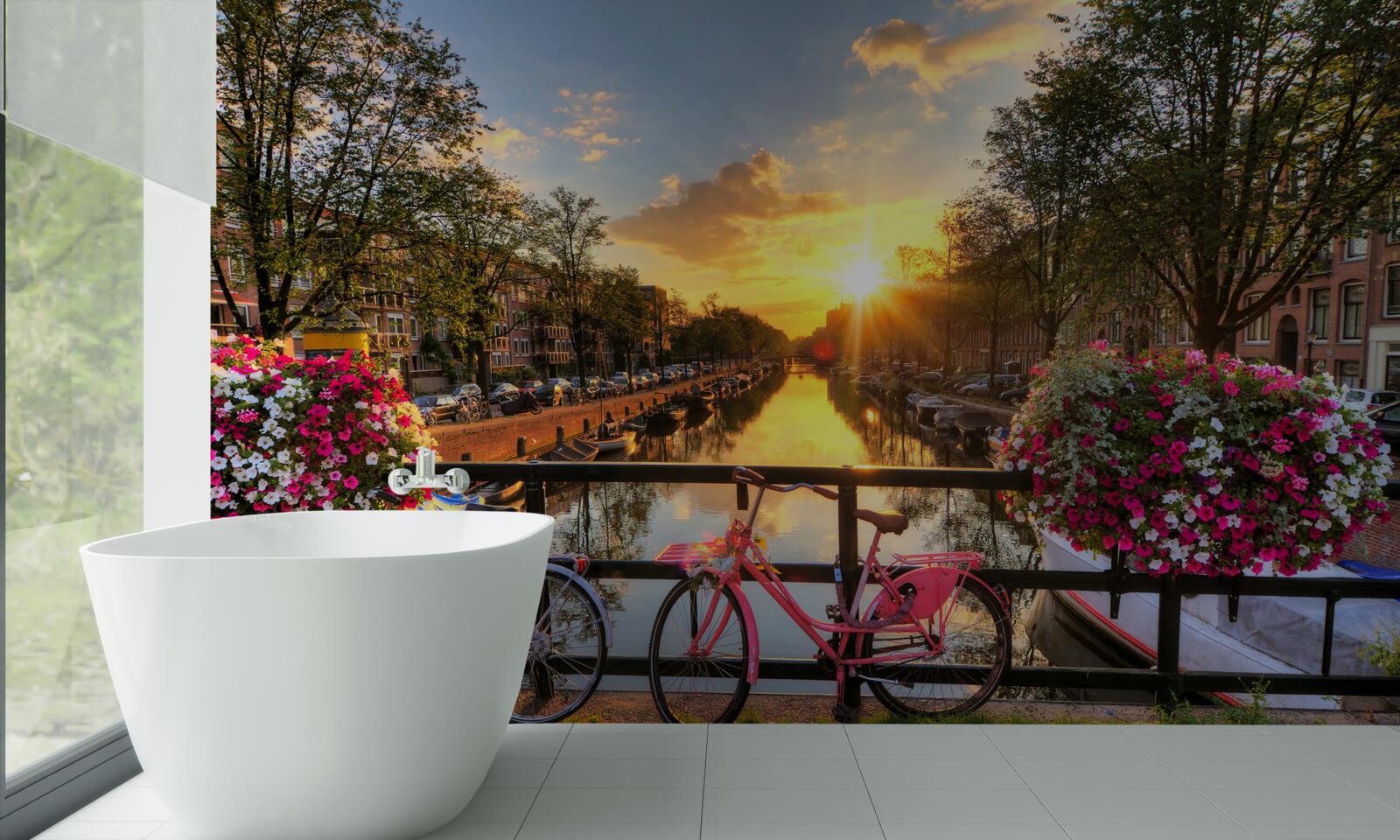 Fototapeta zachód słońca w amsterdamie z rowerami w tle