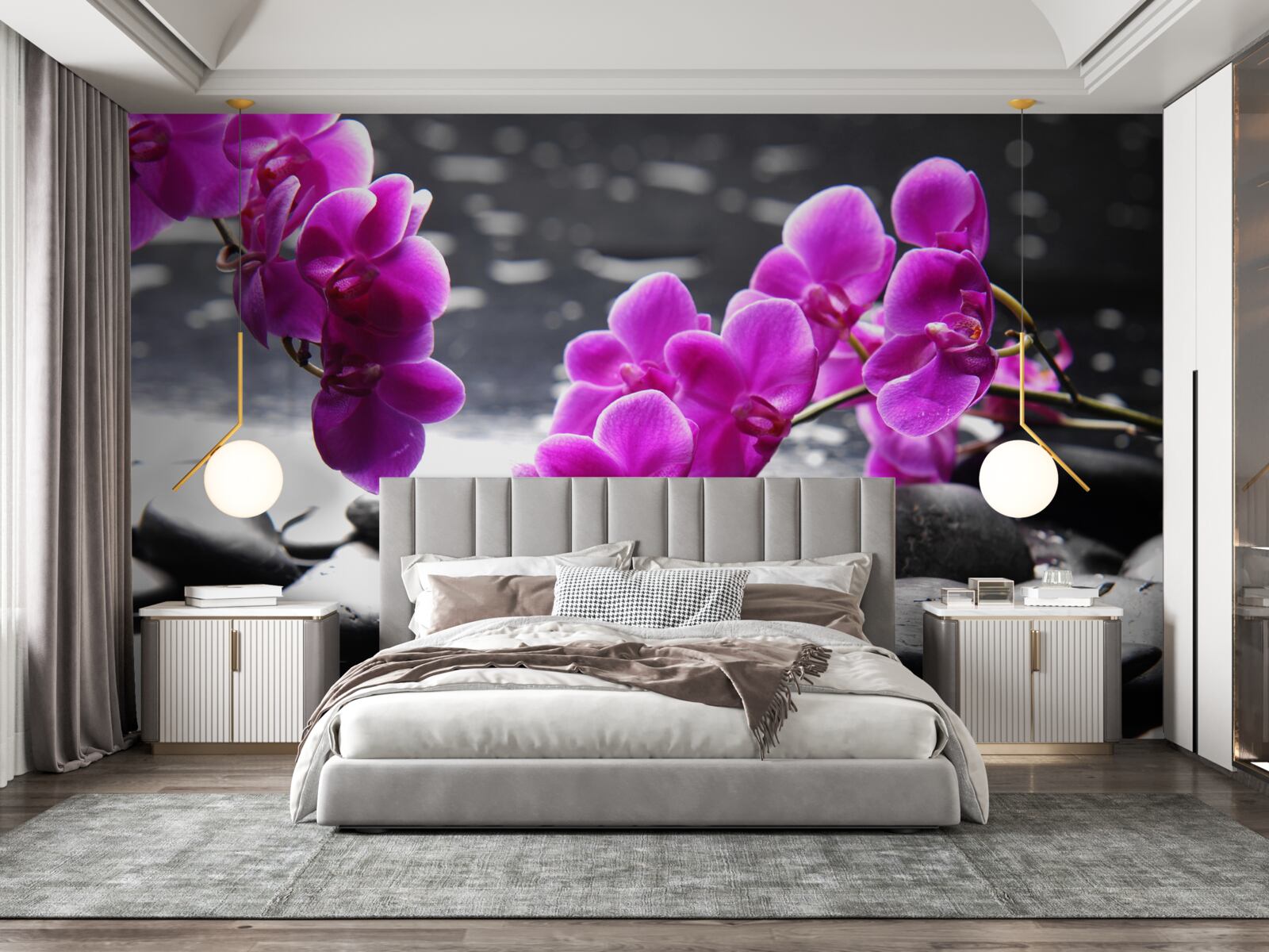 Fototapeta orchidea o liliowym odcieniu, osadzona na matowych czarnych kamieniach