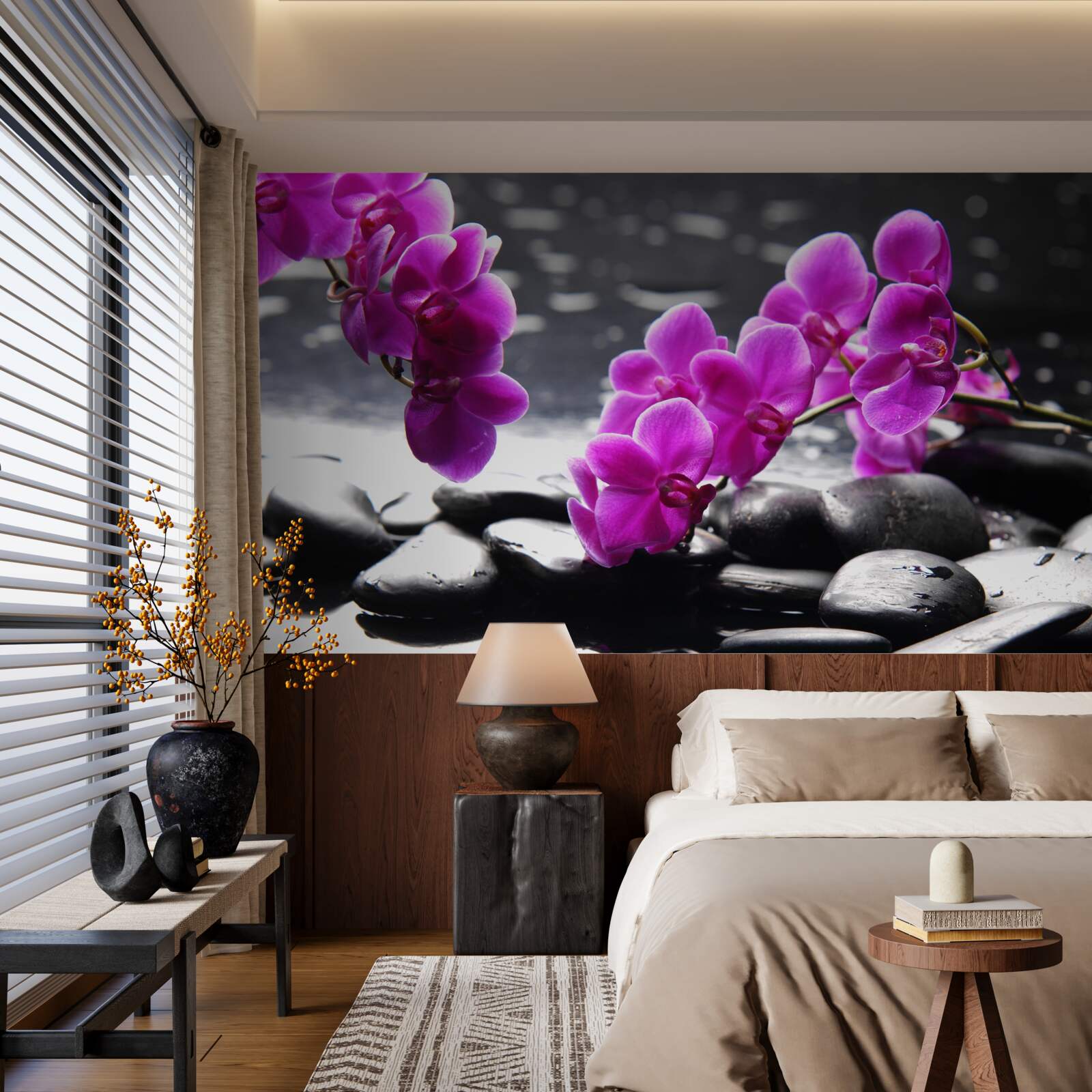 Fototapeta orchidea o liliowym odcieniu, osadzona na matowych czarnych kamieniach