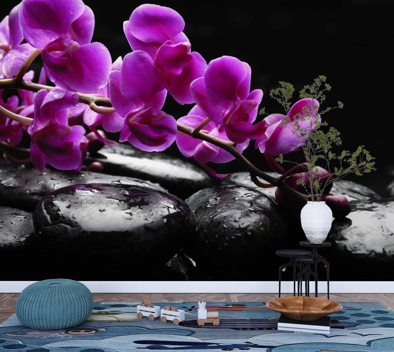 Fototapeta czarny kamień z fioletową gałązką orchidei